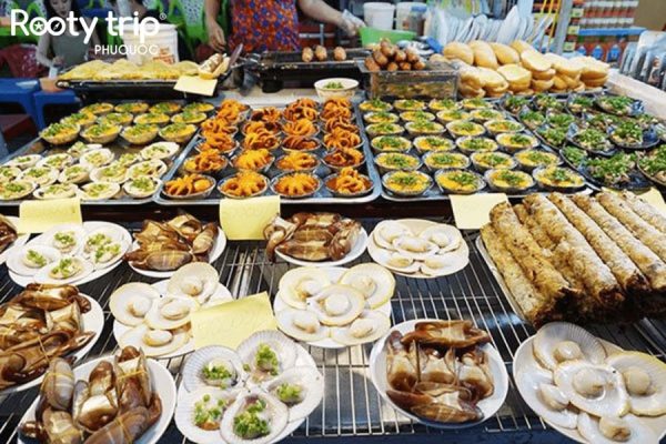 Indulge in exploring and experiencing the unique culinary culture at Phu Quoc Night Market included in the 3-day 2-night Phu Quoc Tour package departing from Hanoi by Rootytrip Phu Quoc