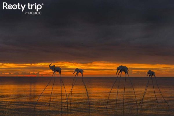 The photo captures the vibrant sunset moments at Sunset Sanato Phu Quoc, included in the 4-day 3-night Phu Quoc Tour package departing from Ho Chi Minh City
