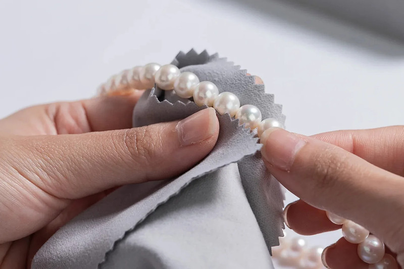 cleaning pearls with a soft cloth