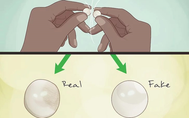 rubbing two pearls to test authenticity
