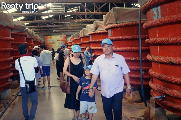 Tourists visit Phu Quoc Fish Sauce Vat House