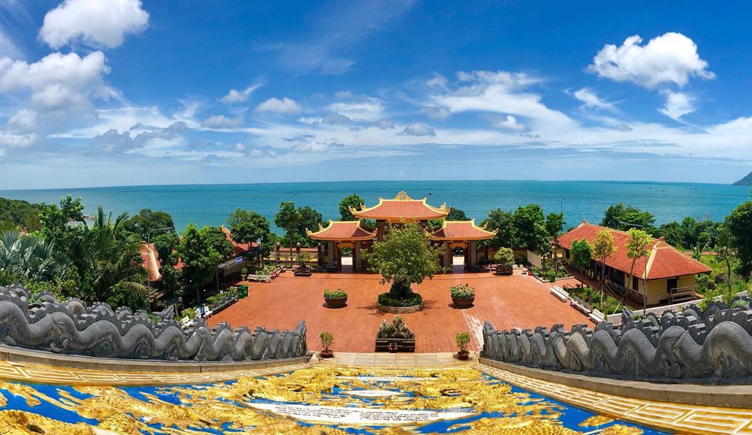 The Hộ Quốc Pagoda in Phu Quoc captured from above overlooking the sea 