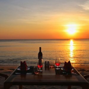 snorkeling tour to see coral reefs and watch the sunset.